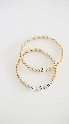 Iniciais da pulseira Muse